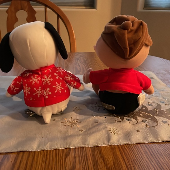 Snoopy and Charlie Brown w/ buttons on their feet to play tunes. Just like new. - Picture 3 of 4